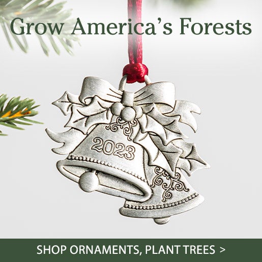 Image of a 2023 pewter bells ornament. GROW America's Forests! Shop Ornaments, Plant Trees.