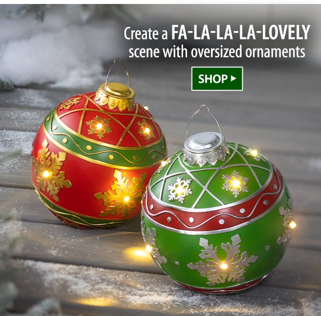 Create a fa-la-la-la-lovely scene with oversized ornaments