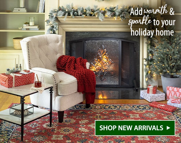 Image of St Charles Fireplace Screen, Misty Pine Trees, Winter Frost Garland & Wreath, Willow Oaks Rug, Beverly Chair. Add warmth & sparkle to your holiday home. Shop New Arrivals
