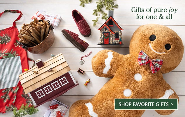 Image of Lighted Christmas Cottage Birdhouse, Acorn Women's Textured Moccasin Slippers, Christmas Advent Barn Turntable with Farm Animals and Santa, Gingerbread Plush Cuddle Holiday Body Pillow, Holiday Peaceful Pine Cotton Apron, Solid Pewter Christmas Tree Ornaments, Solitaire Amaryllis Flower Bulb Holiday Gift Garden, Fatwood filled Copper-Finished Hammered Metal Firewood Buckets with Leaf Handles and Extra Large Virginia Peanut Trio Gift Tower. Gifts of pure <i>joy</i> for one & all.  SHOP FAVORITE GIFTS