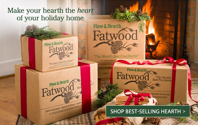 Image of assorted Fatwood Boxes with greenery around them and red ribbons. Make your hearth the <i>heart</i> of your holiday home. SHOP BEST-SELLING HEARTH