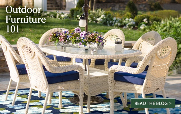 Outdoor Furniture 101 - Read the Blog > Image of a white wicker Prospect Hill dining set.