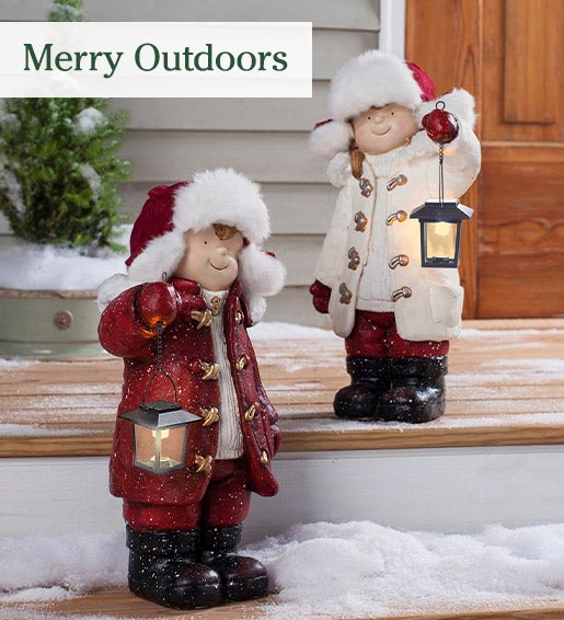 Image of Wintertime Children with Lanterns Solar Garden Statues, Set of 2. Merry Outdoors