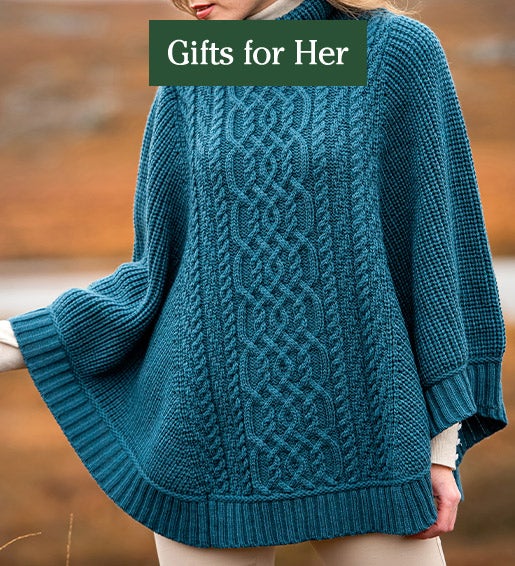 Image of Woman modeling Irish Merino Wool Super Soft Ribbed Poncho in teal