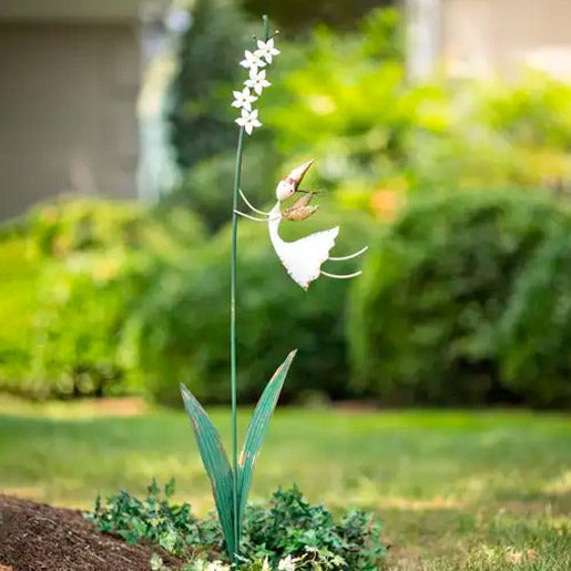 metal garden stake flower with fairy hanging on the side