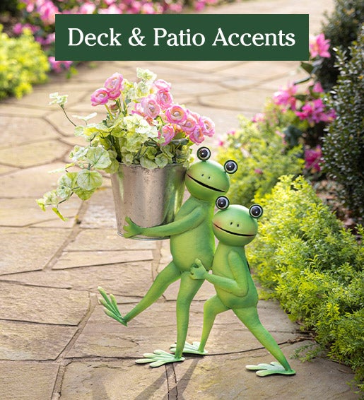 Image of Indoor/Outdoor Metal Friendly Frogs Planter with flowers outdoors. Deck & Patio Accents