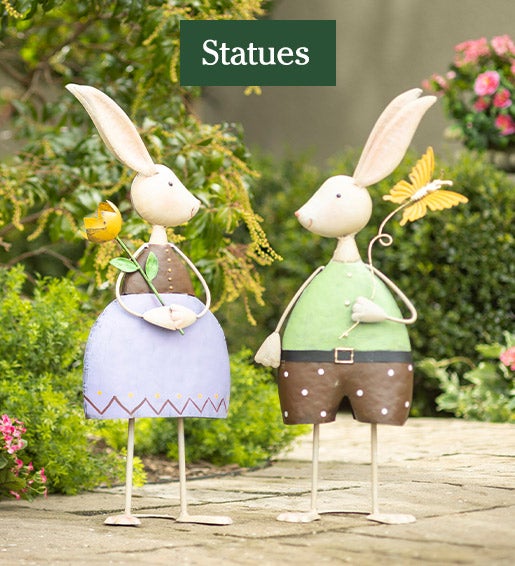 Image of Two Metal Bunnies. Statues