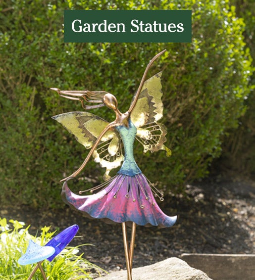 Image of Oversized Bronze Fairy Garden Statue in yard. Garden Statues