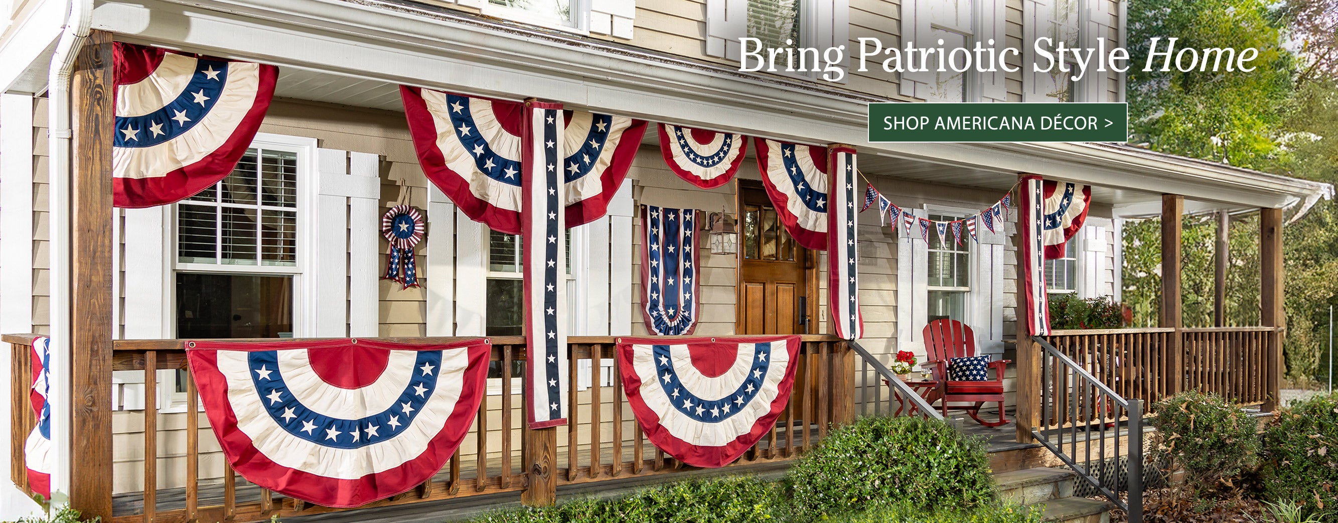 Image of americana buntings on front porch. Bring Patriotic Style Home SHOP AMERICANA DECOR