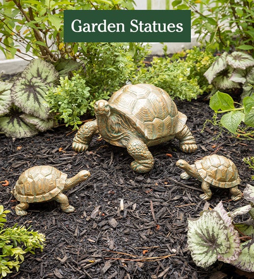 Image of Tortoise Family Resin Garden Accents in yard. Garden Statues