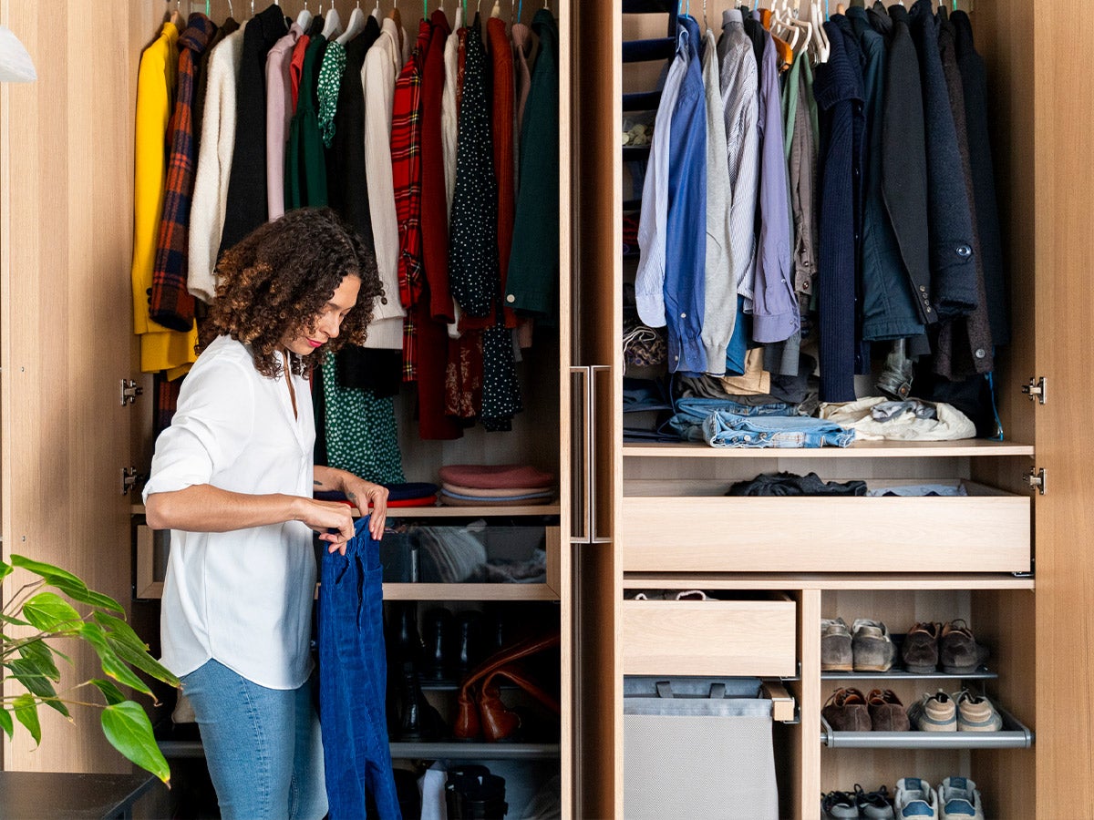 woman organizing closet