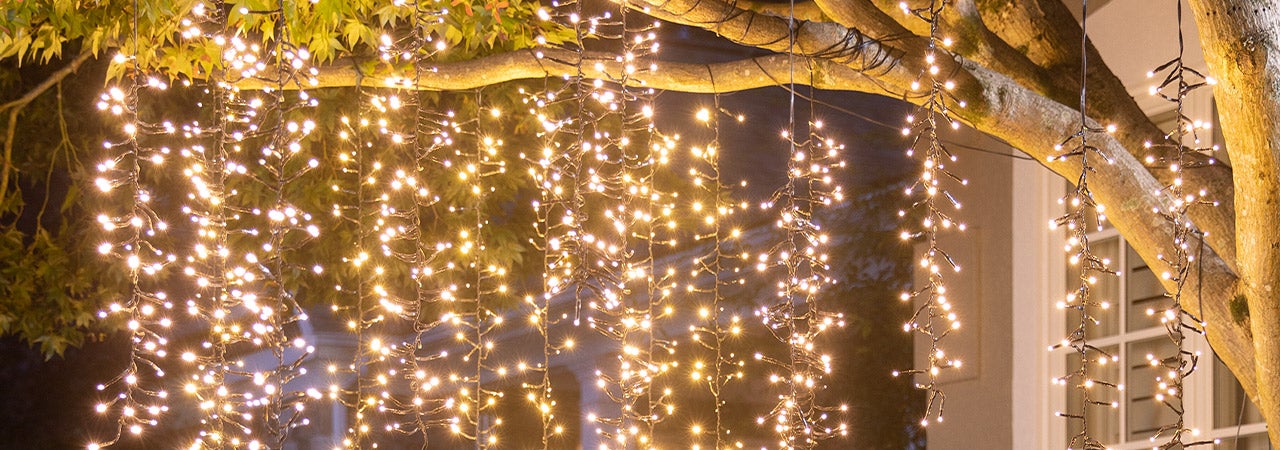 outdoor christmas lights hanging from tree