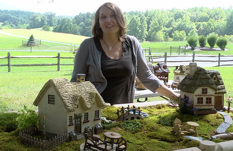 woman with fairy houses