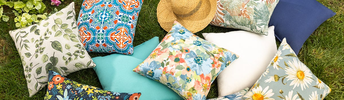 pile of outdoor pillows