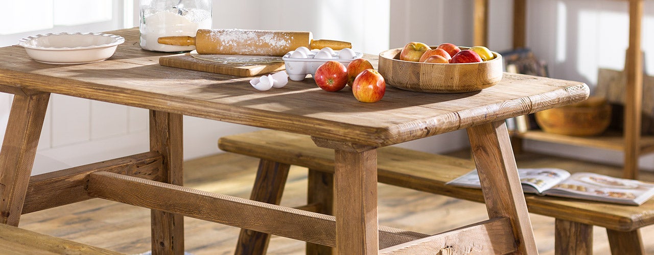 Indoor Furniture Collections: Intro shot of a Rowan Ridge rustic farmhouse kitchen table in reclaimed wood.