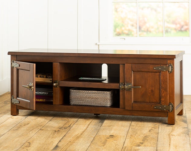 A Portland ice box style TV cabinet with storage shelves in a deep brown finish.